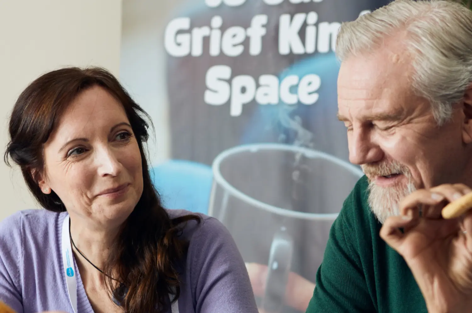 Colleagues talking around a table