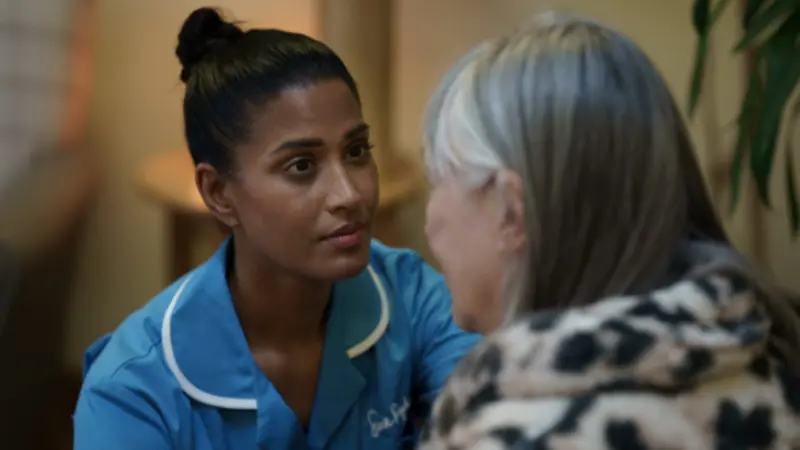 Healthcare professional talking with a patient