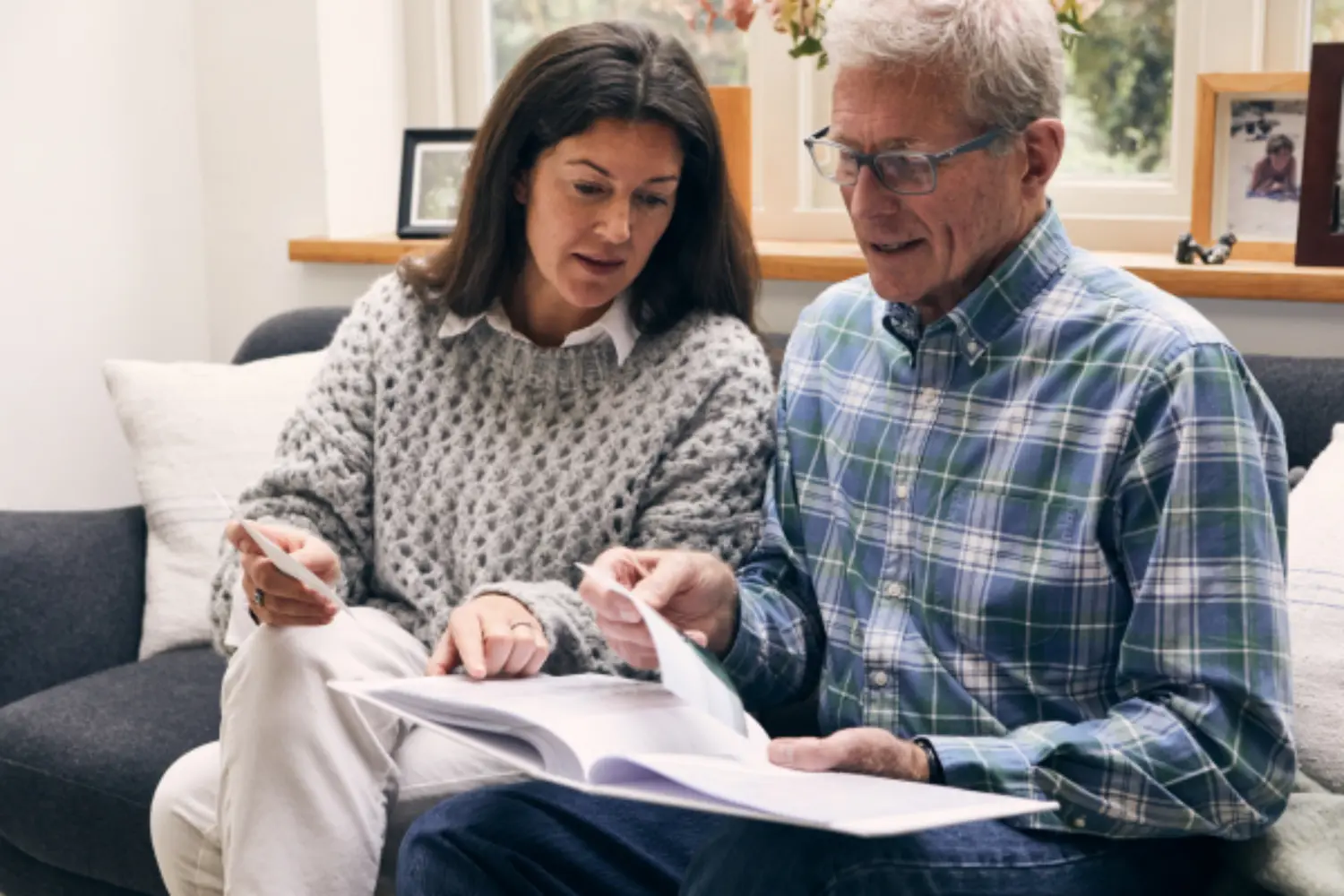 Pair looking through photos