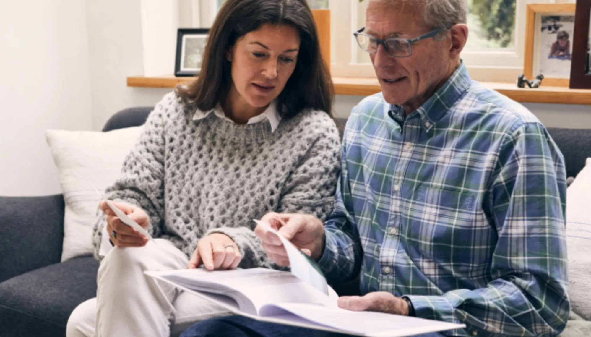 Pair looking through photos