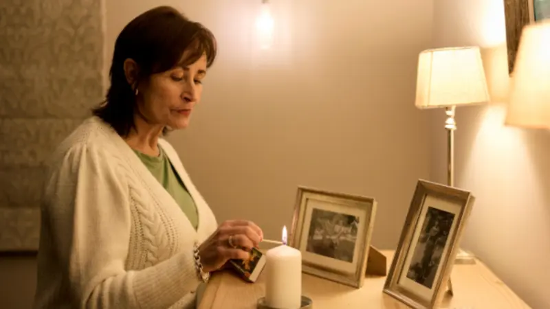 Relative lighting a candle